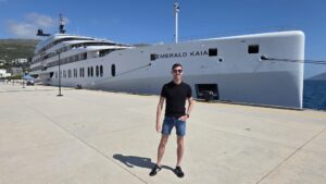 Blake-Hatton-Marketing-Manager-of-Complex-Travel-Group-in-front-of-the-Emerald-Kaia-1-scaled.jpg