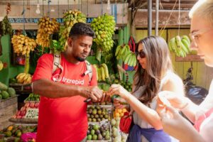 Intrepid-Travel-Sri-Lanka-Kandy-Market-Wander-and-Tasting-leader-Dodan-travellers-Maz-and-Laura-scal.jpeg