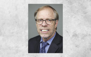 erlandson-w-background-scaled.jpg